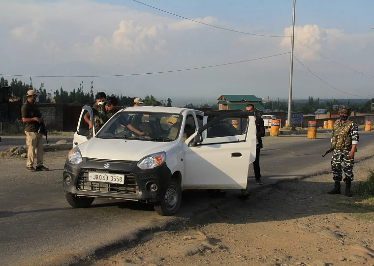 In pics: Ahead of PM Modi's all-party meet on Kashmir, CRPF personnel frisk vehicles amid 48-hour high alert