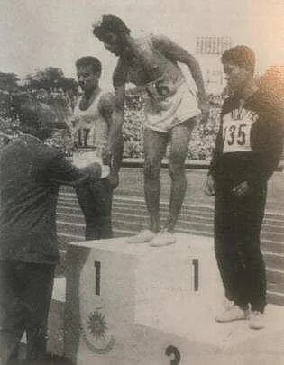 Milkha Singh recieves the gold medal after beating Pakistan’s Abdul Khaliq (in white and on left) in the 200m final in 1958 Tokyo Asian Games. Two years later, Milkha again defeated Khaliq in Lahore.