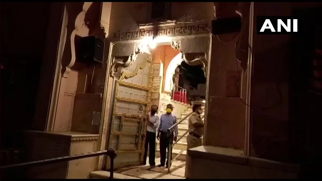 Devotees offer prayers at Brahma Temple in Pushkar, Rajasthan, as it reopened on Monday, June 28, 2021.