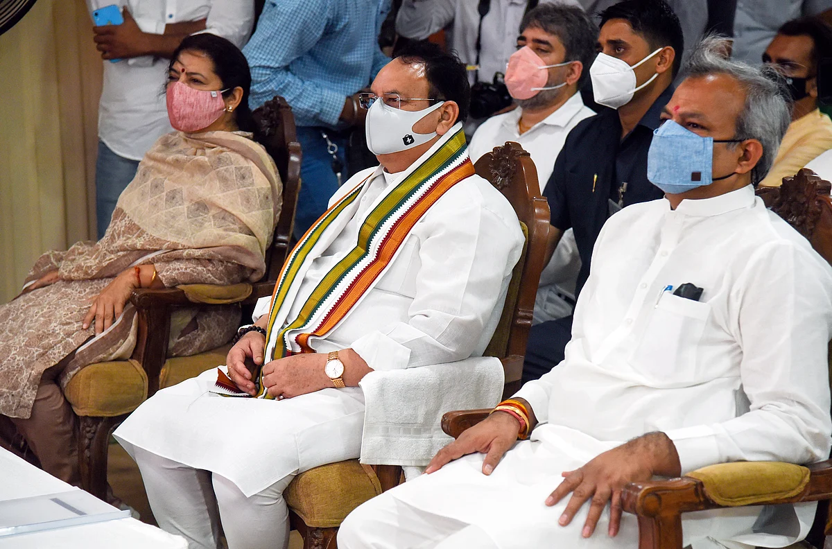 JP National President JP Nadda, party President Adesh Gupta and party leader Meenakshi Lekhi listen to Prime Minister Narendra Modis Mann ki Baat, in New Delhi on Sunday.