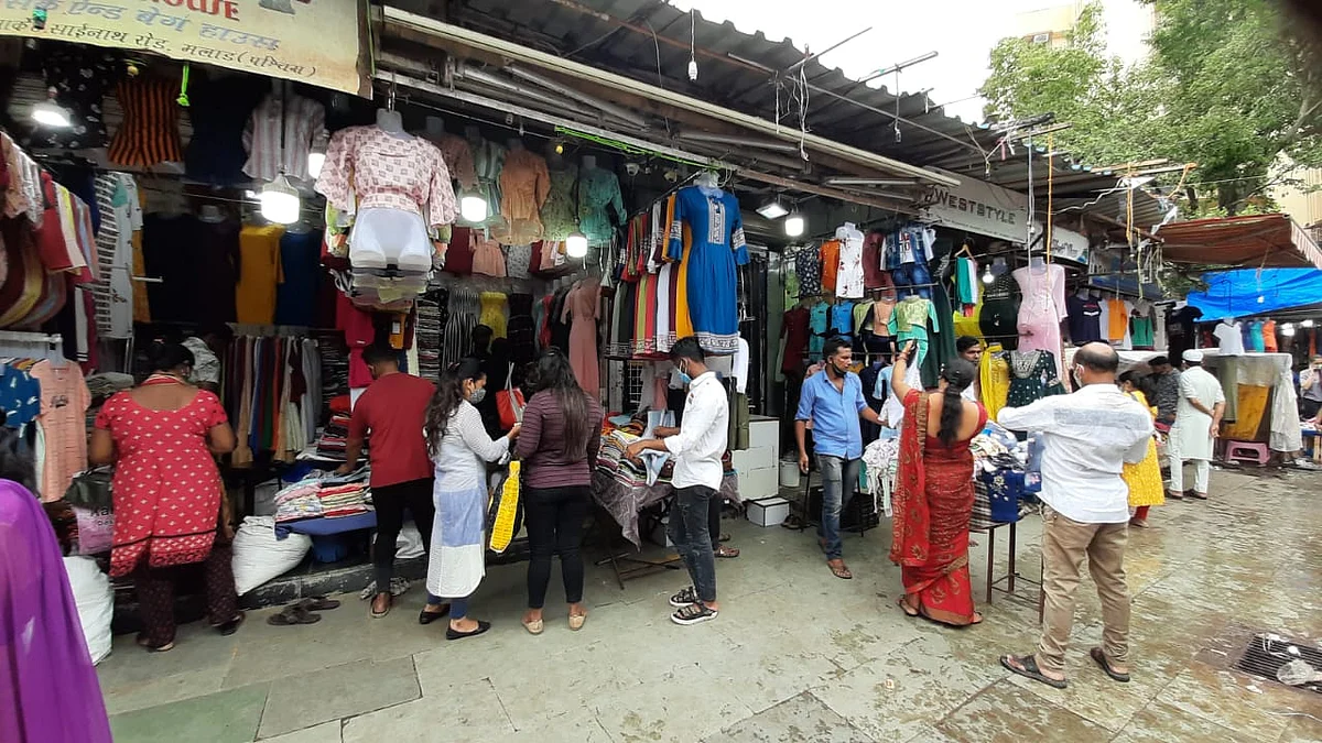 People were seen shopping at the Municipal market in Malad, Mumbai on Monday after the government announced the easing of COVID-induced restrictions.
