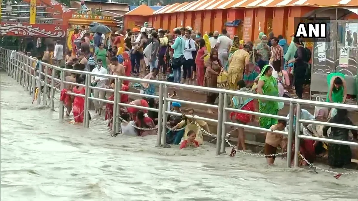 Devotees take holy dip at Har Ki Pauri Ghat, Haridwar in Uttarakhand on Ganga Dussehra on June 20, 2021.