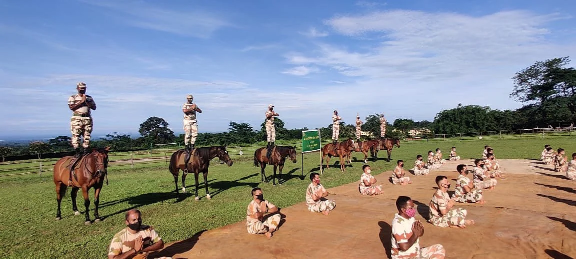 Arunachal Pradesh: ITBP (Indo-Tibetan Border Police) personnel of Animal Training School (ATS), Lohitpur perform yoga, with horses, on International Day Of Yoga.