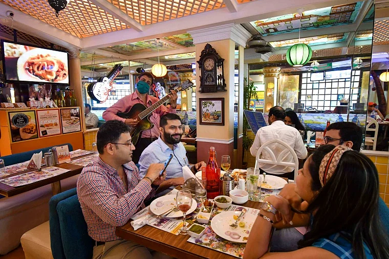 Mahim's Goa Portuguesa hotel staff welcome customer by singing songs