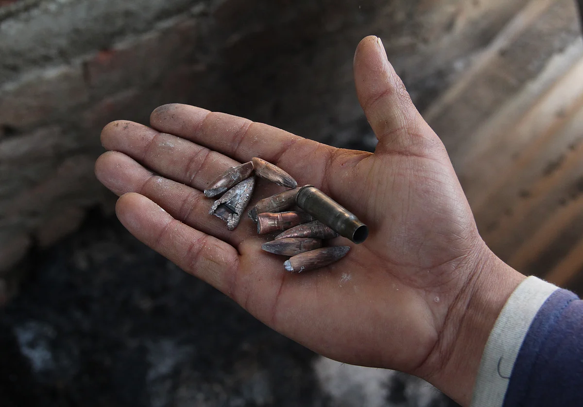 Bullets and bullet shells left at the house damaged during a gunfight between security forces and militants in Maloora locality on the outskirts of Srinagar, Jammu & Kashmir.