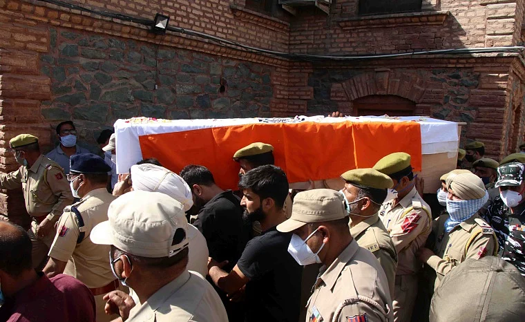 In pictures: Kashmir security officials pay rich tributes to two policemen who lost their lives in Sopore terrorist attack