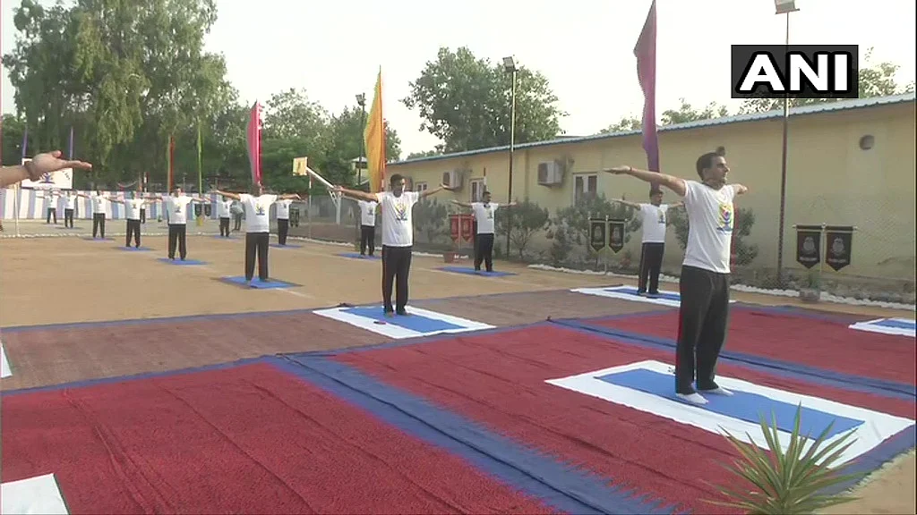 Jammu and Kashmir: CRPF personnel perform Yoga in Jammu, on International Day Of Yoga.