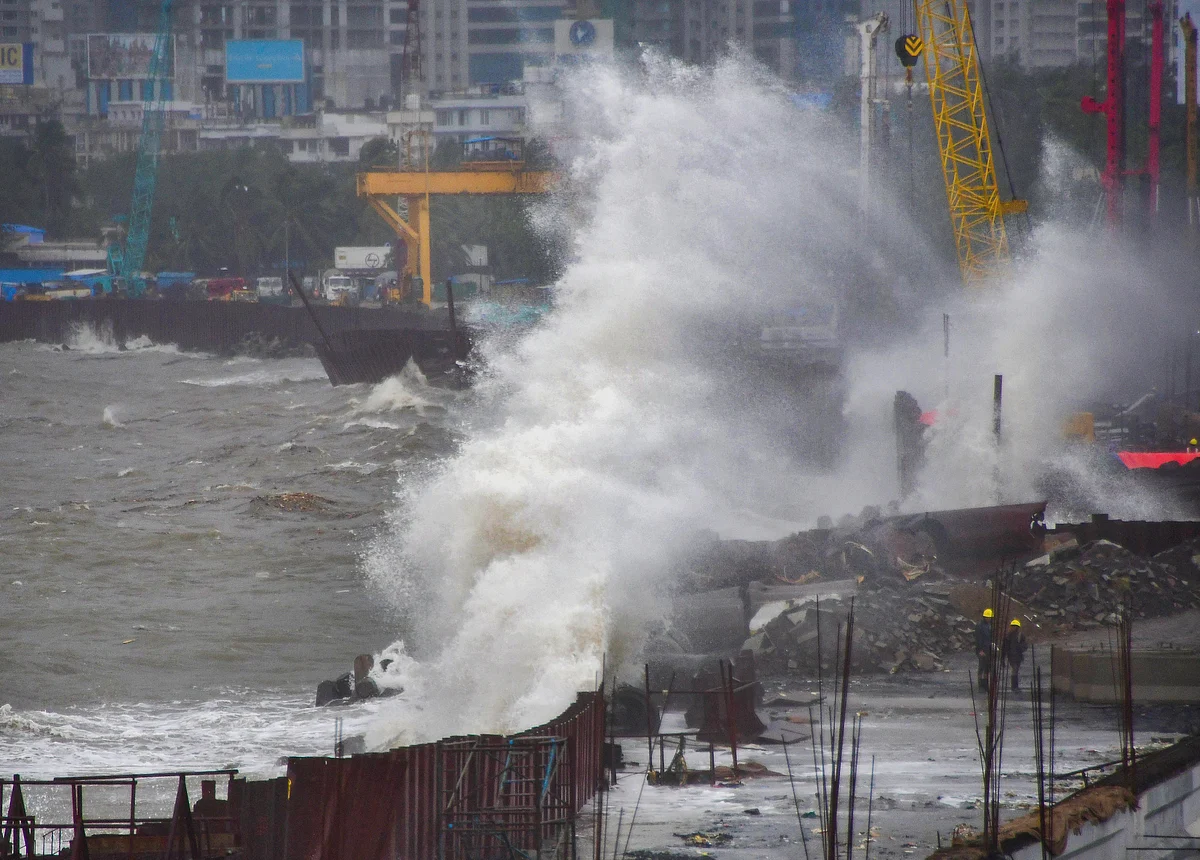 Sea waves crash ashore during high tide, at Marine Drive in Mumbai, Tuesday, June 15, 2021.