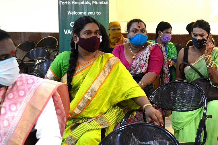 Members of the transgender community wait to get themselves inoculated with the Covid-19 coronavirus vaccine at a hospital in Mumbai on June 20, 2021
