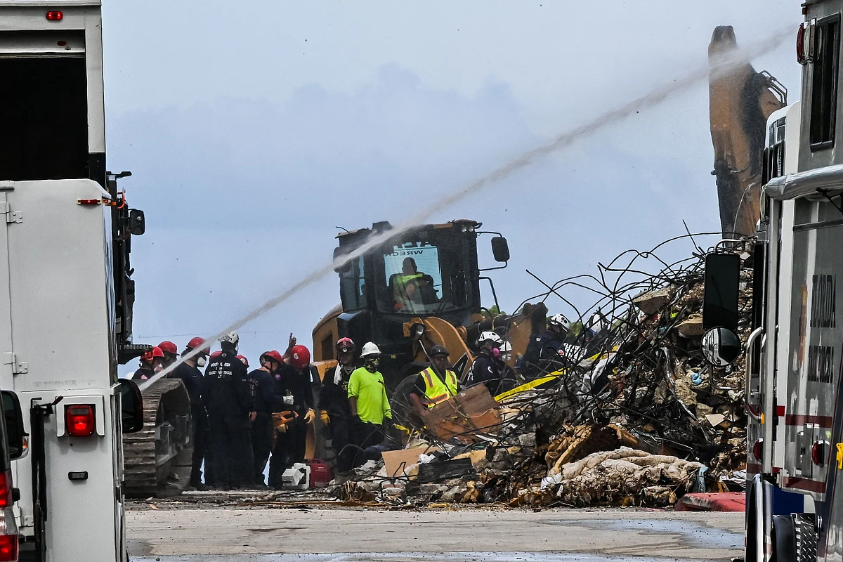 Rescue workers continue to search the rubble at the site of a collapsed building in Surfside, Florida, north of Miami Beach, on June 26, 2021.