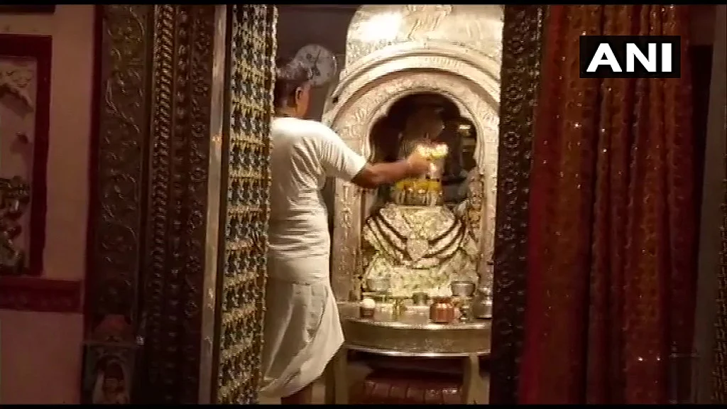 Devotees offer prayers at Brahma Temple in Pushkar, Rajasthan, as it reopened on Monday, June 28, 2021.