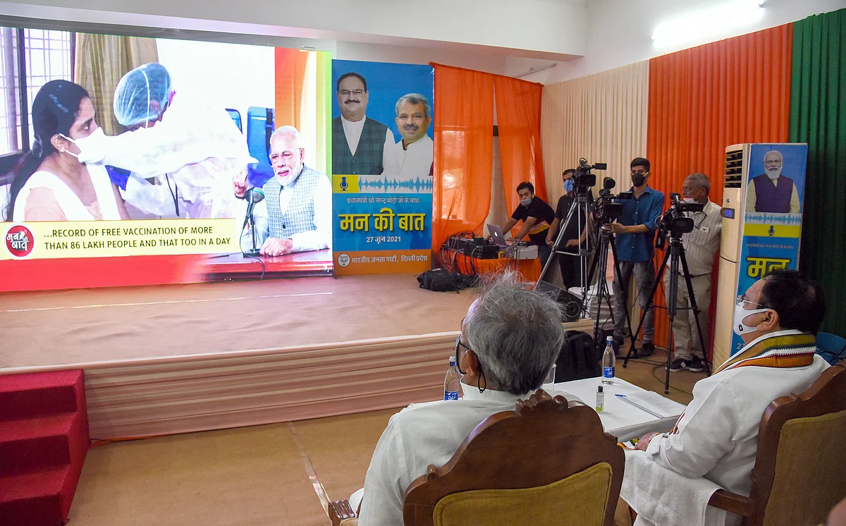 BJP National President JP Nadda along with party President Adesh Gupta listen to Prime Minister Narendra Modis Mann ki Baat, in New Delhi on Sunday.