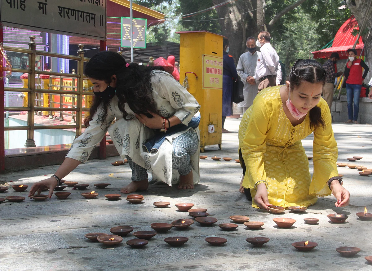 In Pics: Amid COVID-19 hundreds of devotees gather for annual Kheer Bhawani mela in Kashmir