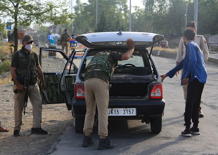 CRPF personnel conduct search in a car