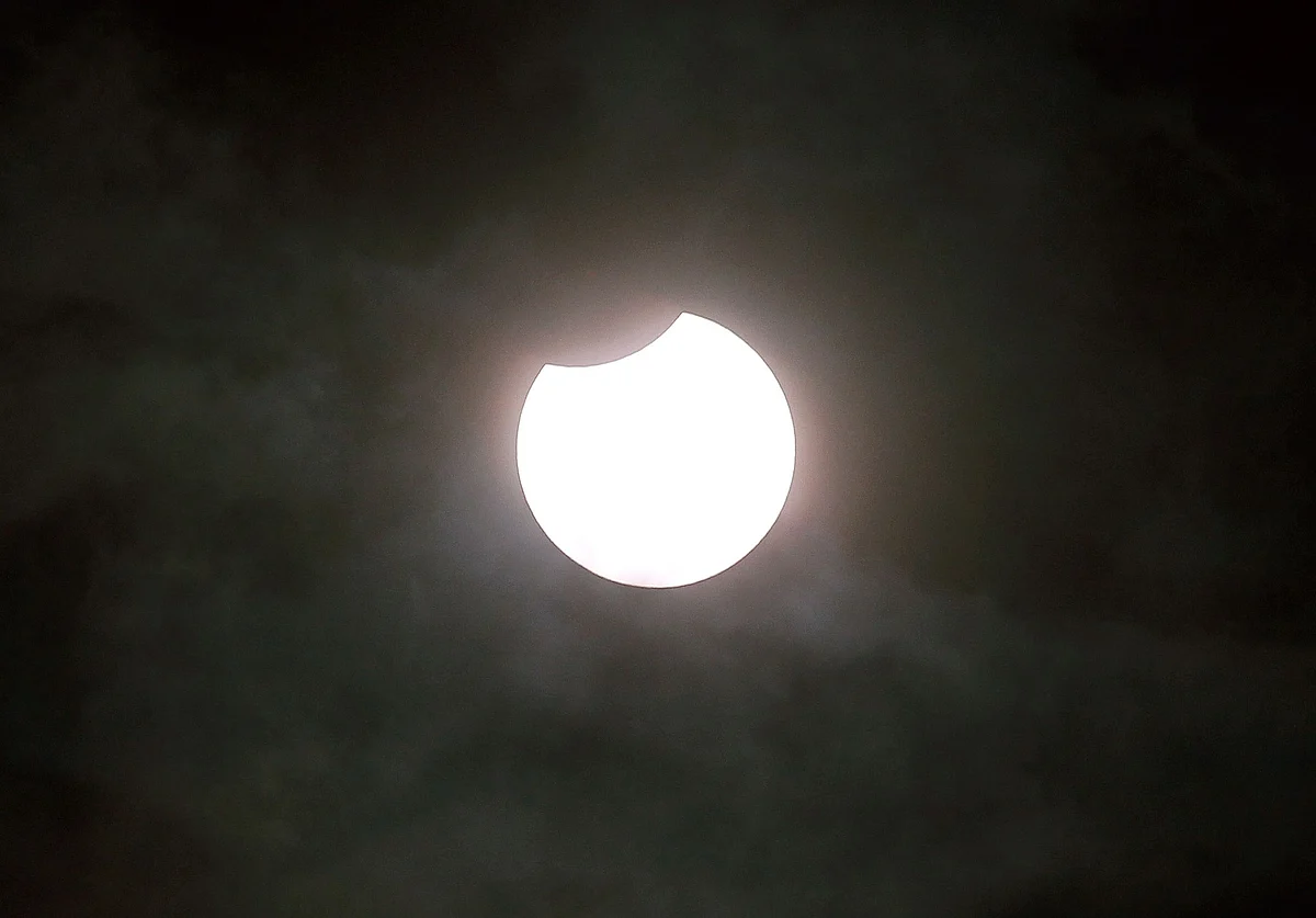 A picture taken on June 10, 2021 shows a partial solar eclipse, pictured in Gaiberg near Heidelberg, southwestern Germany, on June 10, 2021.