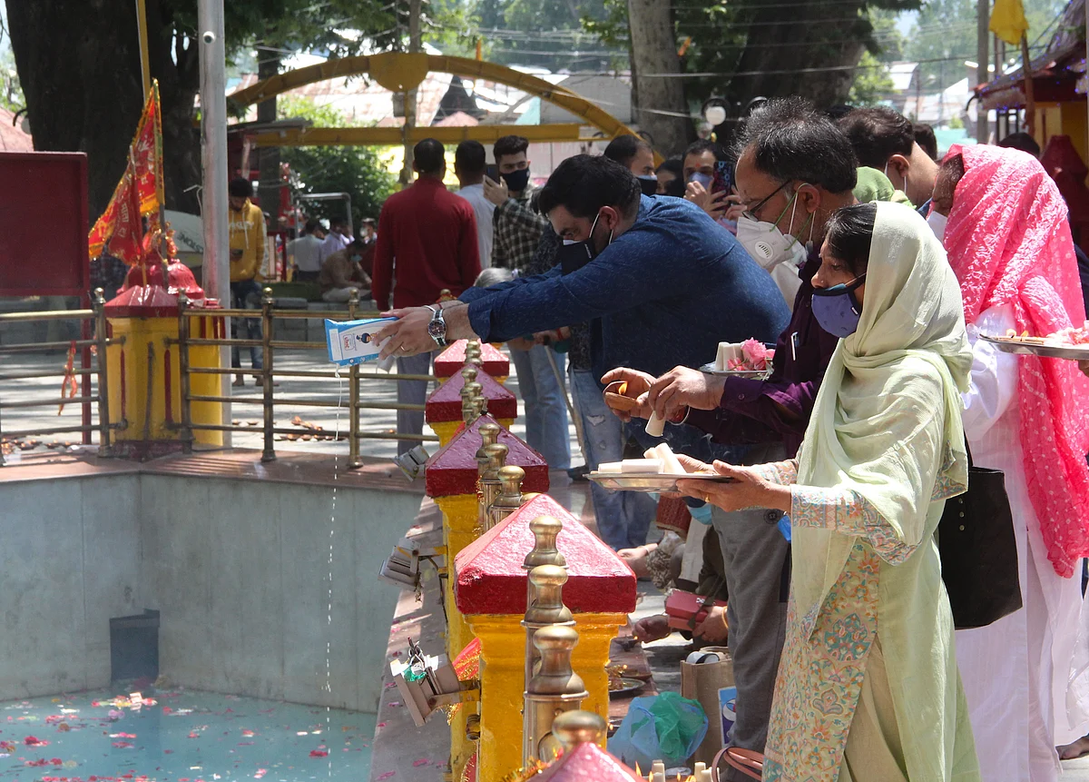 In Pics: Amid COVID-19 hundreds of devotees gather for annual Kheer Bhawani mela in Kashmir