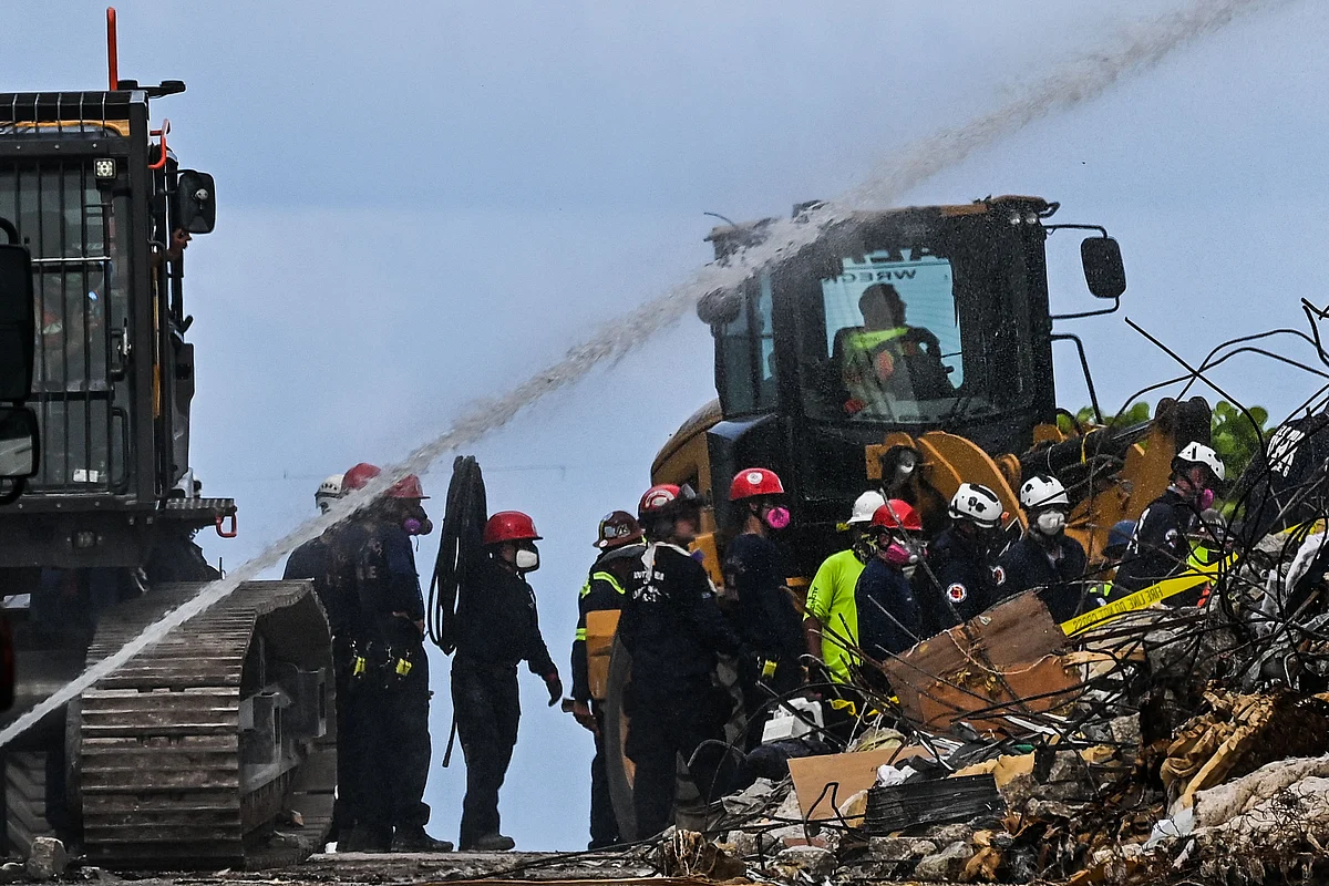Rescue workers continue to search the rubble at the site of a collapsed building in Surfside, Florida, north of Miami Beach, on June 26, 2021.