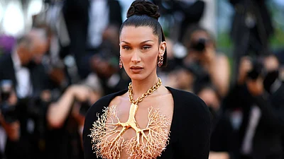 Bella Hadid sports tiny bikini during yacht outing with boyfriend Marc Kalman in Cannes Bella Hadid sports tiny bikini during yacht outing with boyfriend Marc Kalman in Cannes