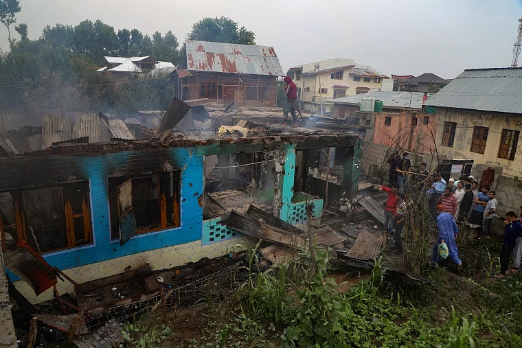 A view of a house damaged in an encounter between the security forces and militants Pulwama town, South of Kashmir