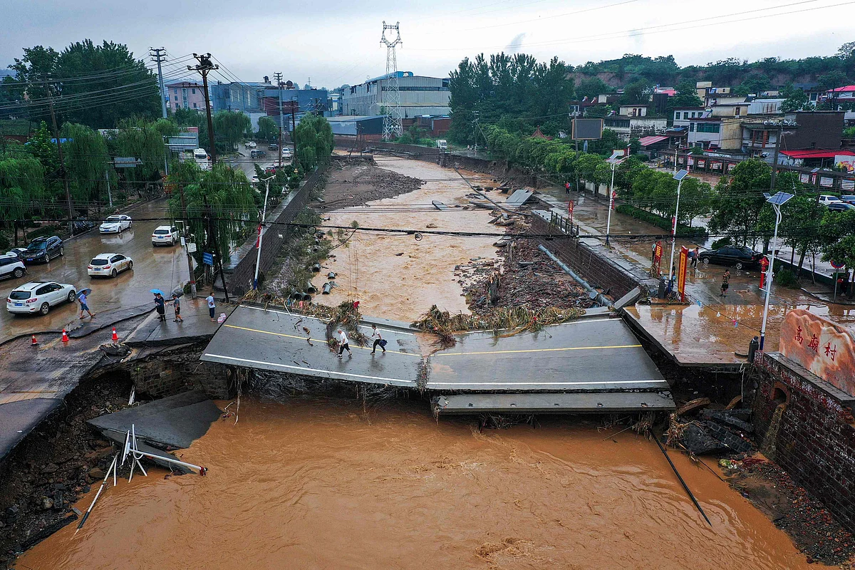 This aerial photo taken on July 21, 2021 show a damaged bridge following heavy rains which caused severe flooding in Gongyi in Chinas central Henan province.