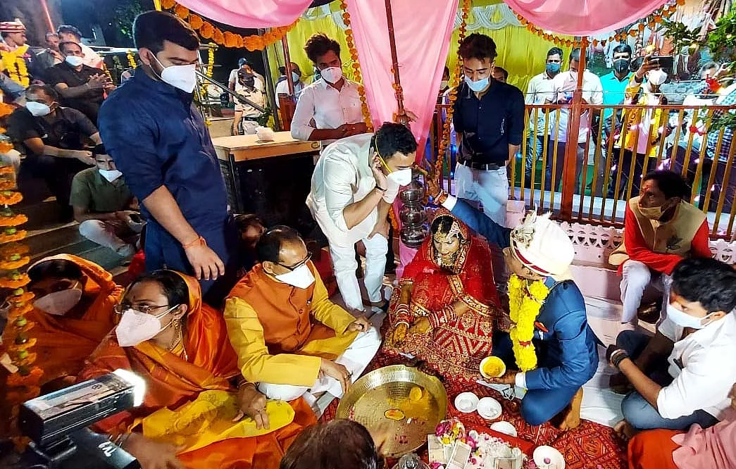Chief Minister Shivraj Singh Chouhan and his wife Sadhna Singh perform wedding ritual of their adopted daughter in Vidisha on Thursday.