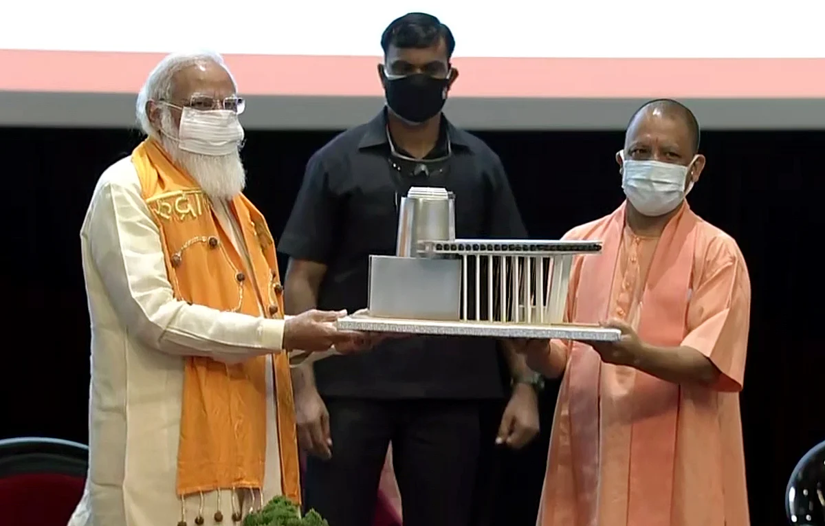 Prime Minister Narendra Modi being felicitated with a memento of Rudraksha Convention Centre by Uttar Pradesh CM Yogi Adityanath during the inauguration ceremony of Rudraksha Convention Centre, in Varanasi on Thursday.