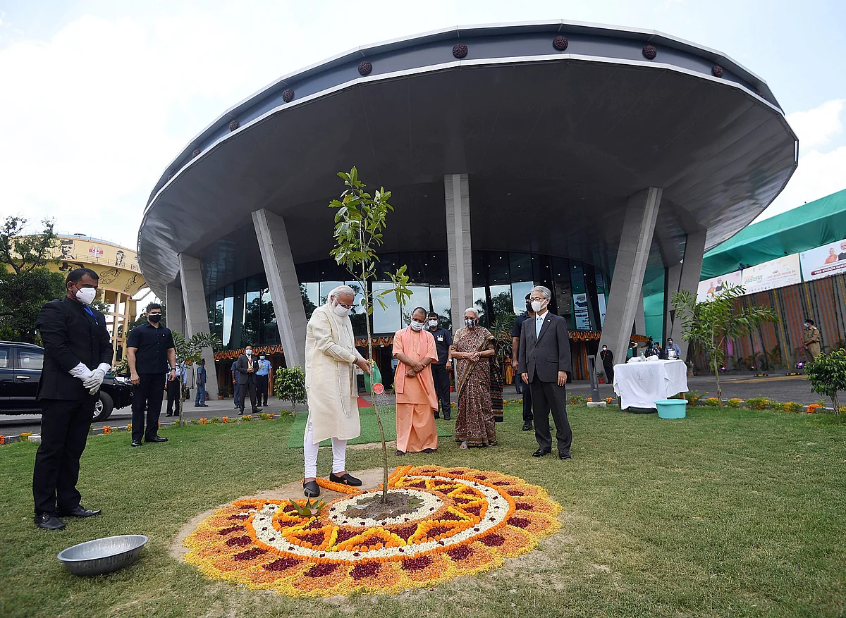 Prime Minister Narendra Modi planting a sapling at the inauguration of the International Cooperation and Convention Centre - Rudraksh, in Varanasi on Thursday.
