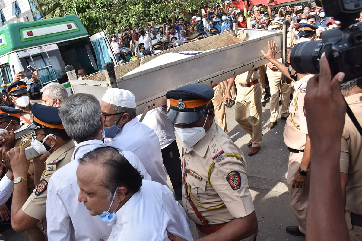 Dilip Kumar funeral: Wrapped in Indian tricolour, legendary actor's mortal remains reach Juhu Qabrastan