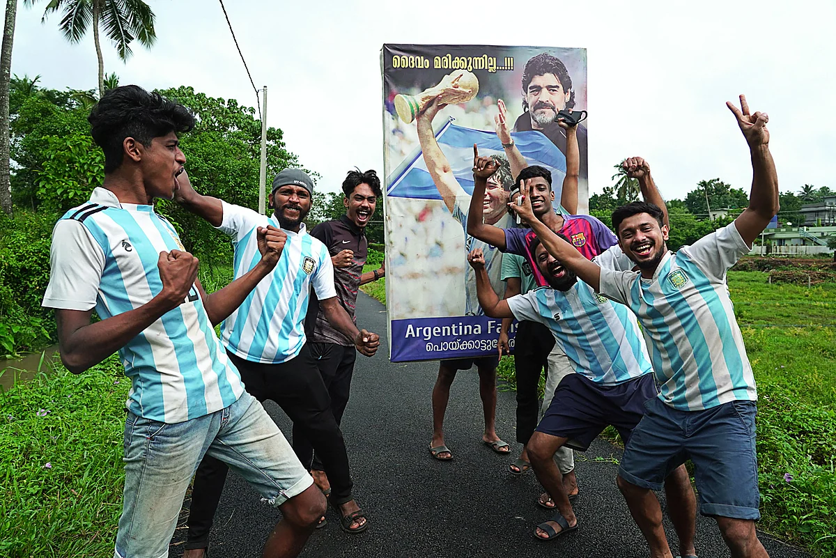 Fans of Argentina celebrate after winning the Conmebol 2021 Copa America football tournament final match against Brazil, in Kurumassery village, about 40 km from Kochi in the Indian state of Kerala on July 11, 2021.
