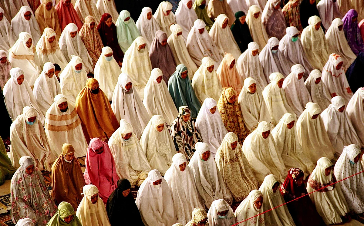 Muslims gather to pray at the Islamic Centre Mosque to mark Eid al-Adha, the annual celebration known as the Festival of Sacrifice, in Lhokseumawe, Aceh on July 20, 2021.