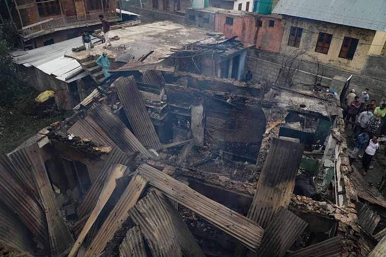 A view of a house damaged in an encounter between the security forces and militants Pulwama town, South of Kashmir