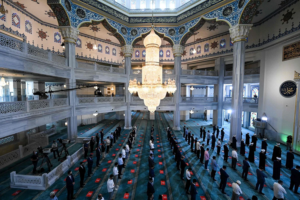 Russian Muslims gather in the Sobornaya mosque, Moscow Cathedral Mosque on July 20, 2021 during celebrations of Eid al-Adha (Kurban Bairam).