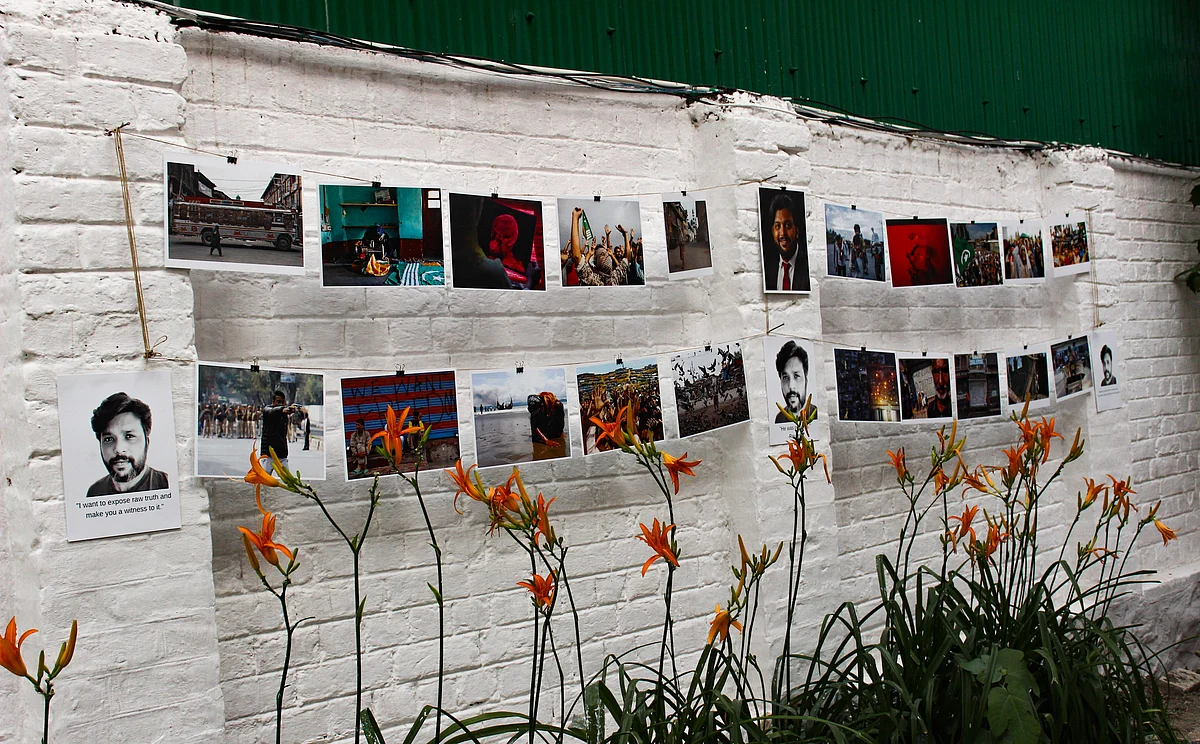 Journalists paid tributes to late photojournalist Danish Siddiqui by holding a candlelight vigil, displaying photographs from his work, and offering prayers at the Kashmir Press Club in Srinagar, Jammu & Kashmir on July 18, 2021.