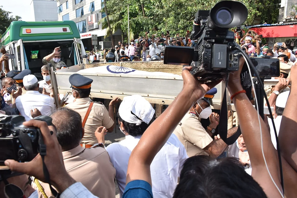 Dilip Kumar funeral: Wrapped in Indian tricolour, legendary actor's mortal remains reach Juhu Qabrastan