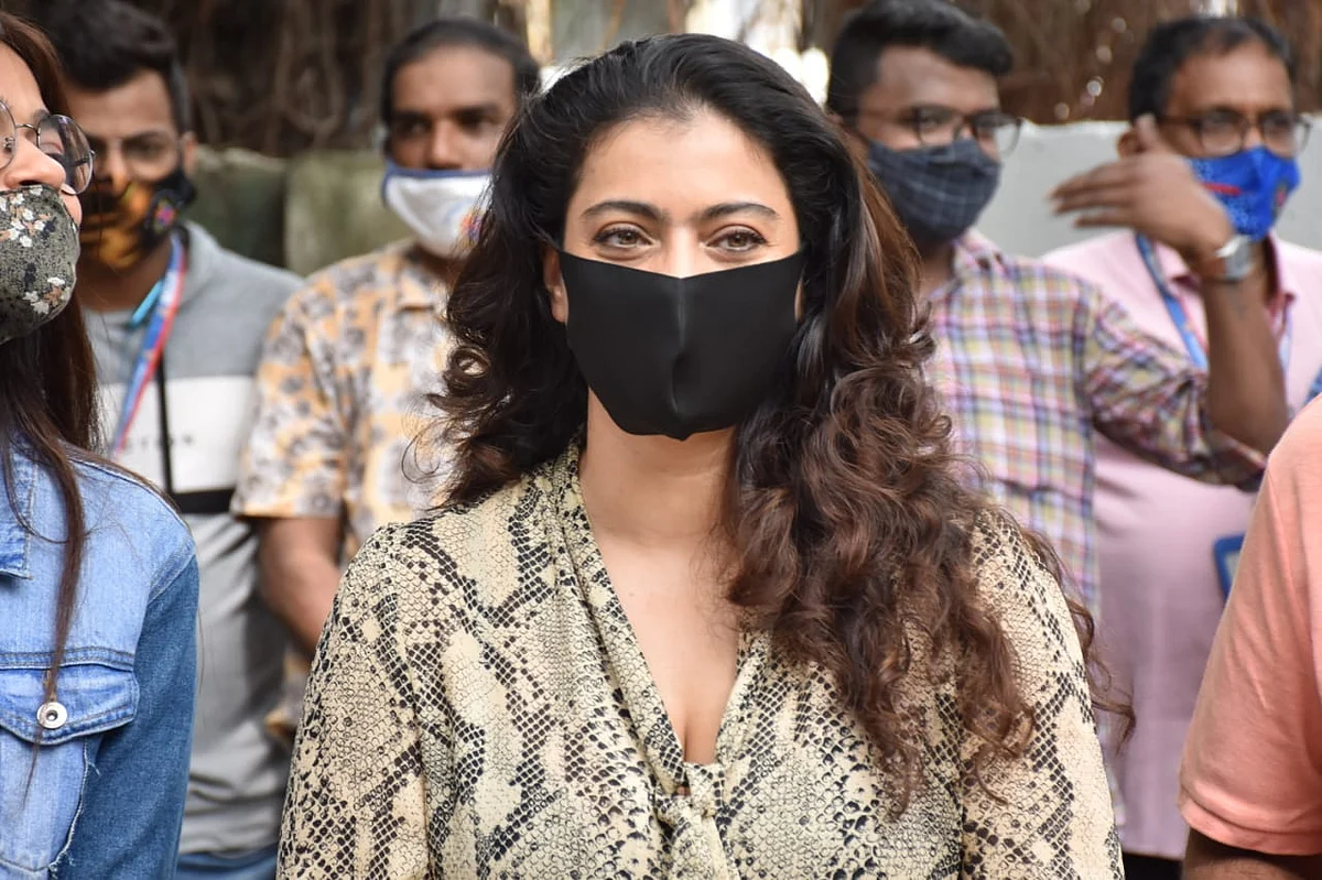 Watch: Kajol requests paparazzi to maintain social distancing as she steps out in Mumbai to distribute raincoats to BMC employees