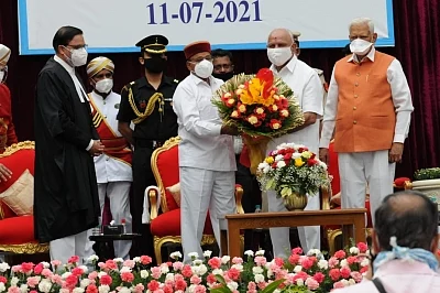 Karnataka Chief Justice AS Oka, Governor Thawarchand Gehlot, chief minister BS Yediyurappa, former Governor Vajubhai Vala at oath taking function