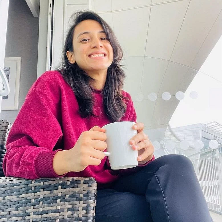 Smriti Mandhana enjoying a hot beverage