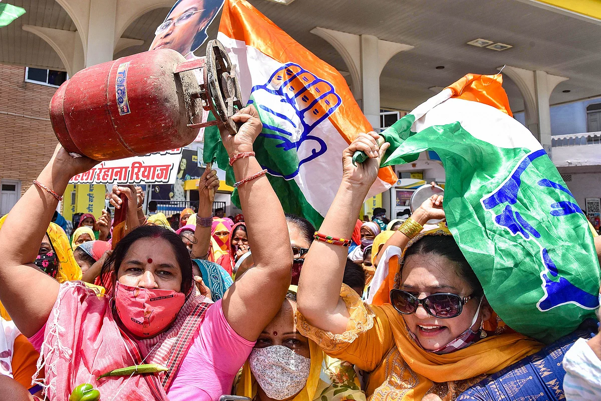 Congress workers stage a protest against hike in the fuel prices, in Bikaner, Rajasthan on Wednesday, July 7, 2021.