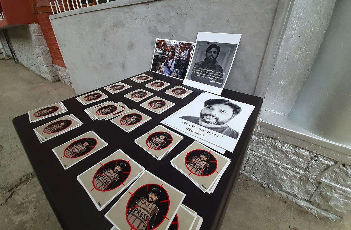 Photographs shot by Reuters photographer Danish Siddiqui are displayed as a tribute to him at the Kashmir Press Club in Srinagar, Jammu & Kashmir on July 18, 2021.