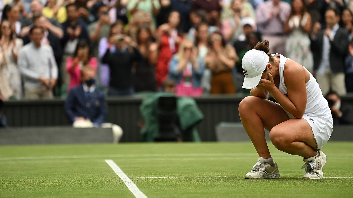 Australias Ashleigh Barty celebrates winning against Czech Republics Karolina Pliskova during their womens singles final match on the twelfth day of the 2021 Wimbledon Championships at The All England Tennis Club in Wimbledon, southwest London, on July 10, 2021.