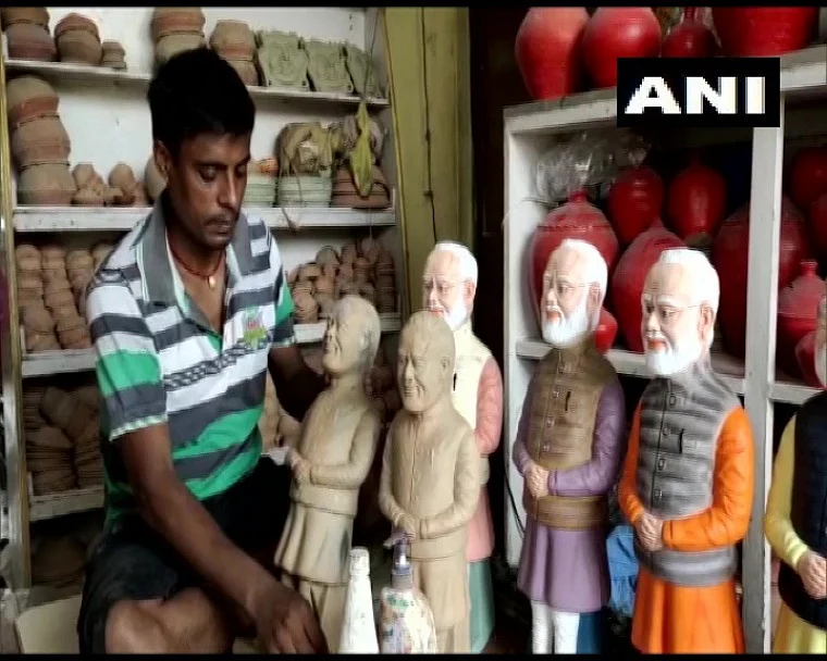 In pics: Bihar sculptor makes PM Modi's statues to use as money storage bank