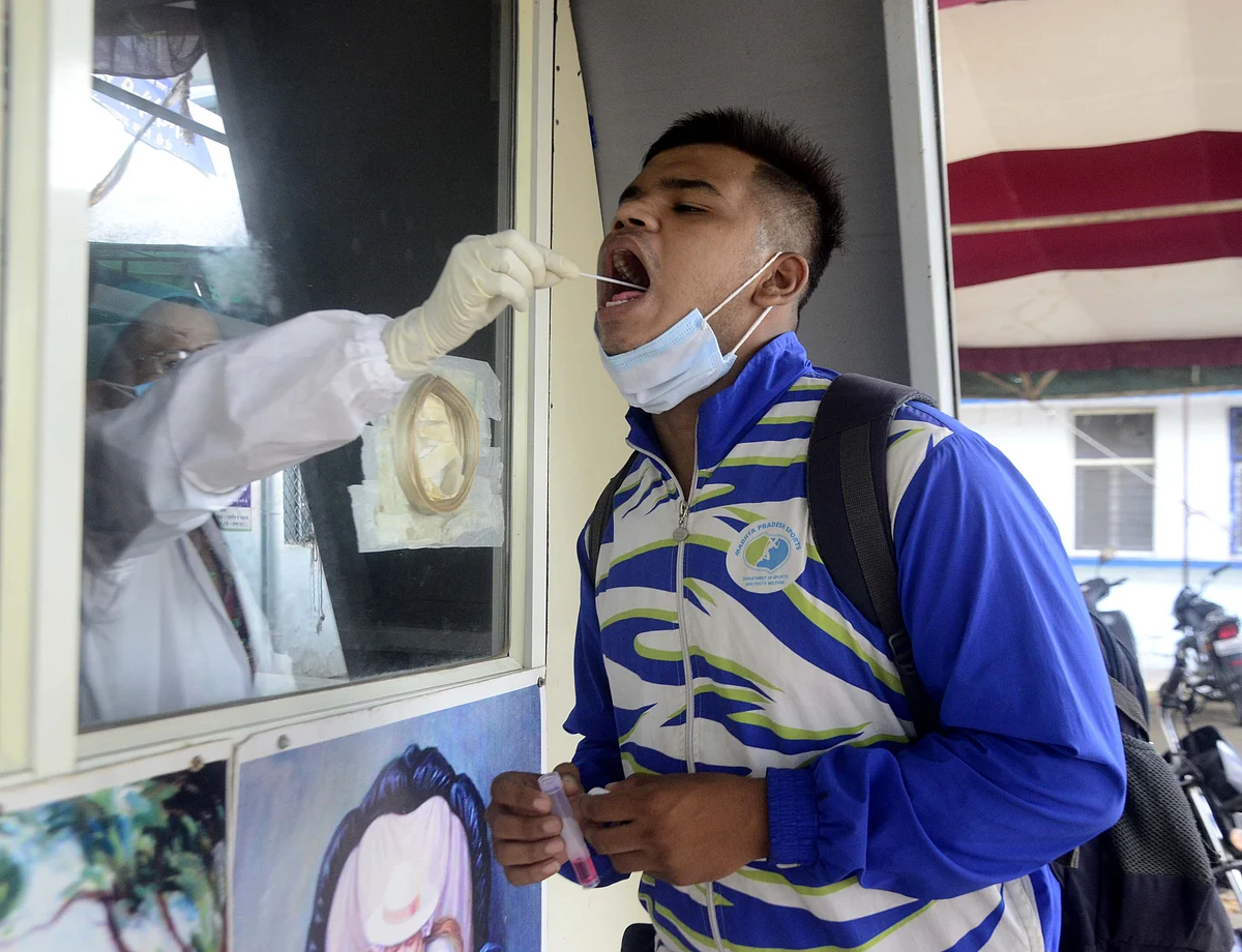 Youth getting himself tested for coronavirus in Bhopal