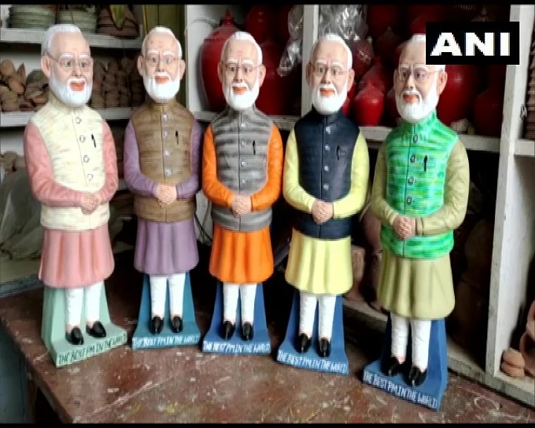 In pics: Bihar sculptor makes PM Modi's statues to use as money storage bank
