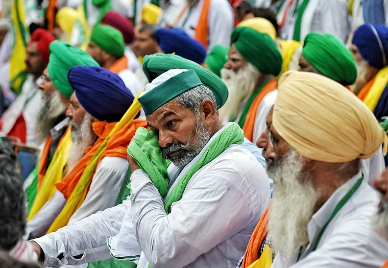 Bharatiya Kisan Union (BKU) leader Rakesh Tikait along with farmers attend Kisan Sansad during a protest against the three farm laws amid the Monsoon session of the Parliament, in New Delhi