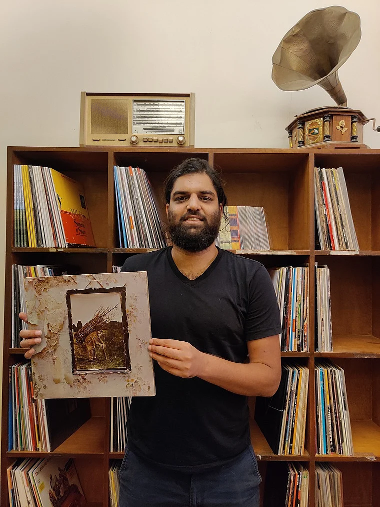 Jude de Souza Founder and CEO of The Revolver Club
with a Led Zepplin album