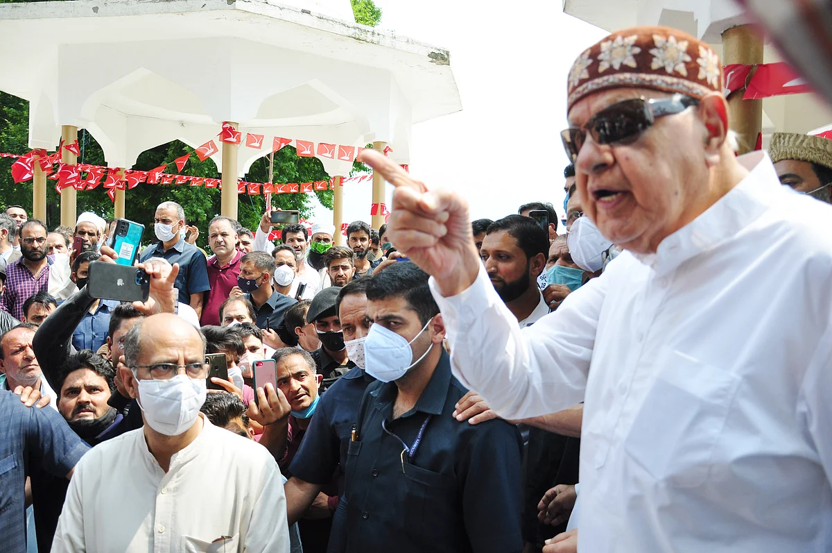 Member of parliament and Jammu and Kashmir National Conference President, Dr. Farooq Abdullah addresses party workers at a gathering on the 21st death anniversary of his mother Begum Akbar Jehan at her grave Hazratbal in Srinagar on Sunday July 11,2021.