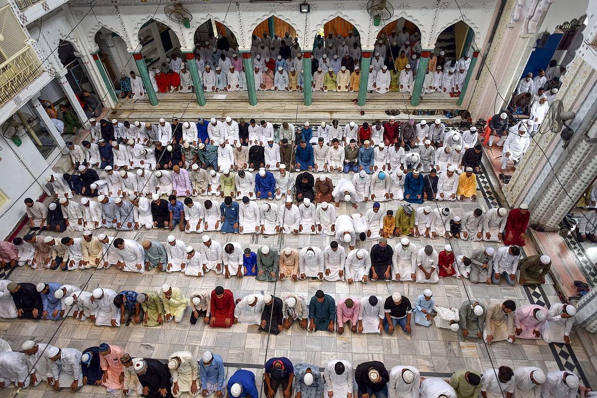 Muslims offer prayers on the occasion of Eid al-Adha at Vashi Ullah mosque, in Prayagraj, Wednesday, July 21, 2021. (PTI Photo)