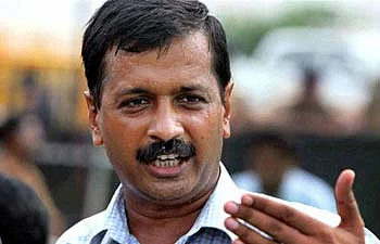 Development of Ambani and Adani, not of farmers in Gujarat: Kejriwal