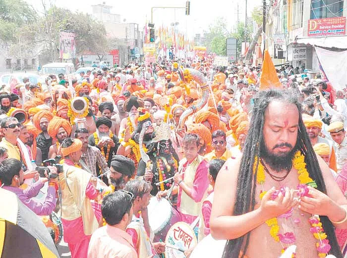 Saints losing in the spiritual glee at Bada Udasin Akhara Peshwai. FP photo