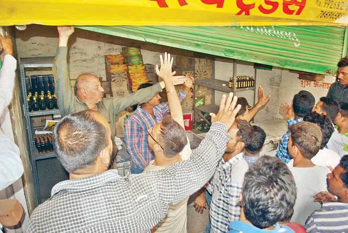 Liquor shop beneath flats Human Rights Commission tells collector to take action